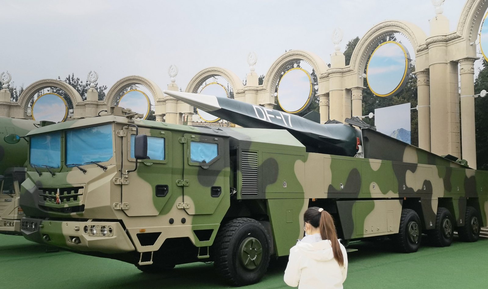 A Chinese DF-17 missile on its camouflaged eight-wheeled launch vehicle, on display in Beijing